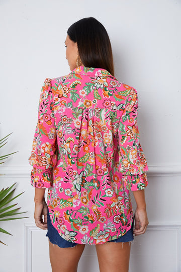 Chemise boutonnée à fleurs et manches à volants