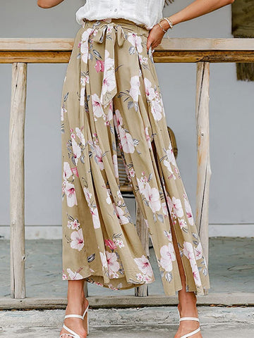 Pantalon large à taille nouée et fente florale