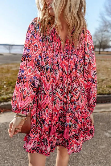 Robe à manches longues et col noué à imprimé pompons