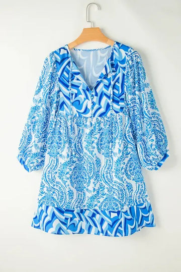 Mini-robe imprimée à manches longues et col noué