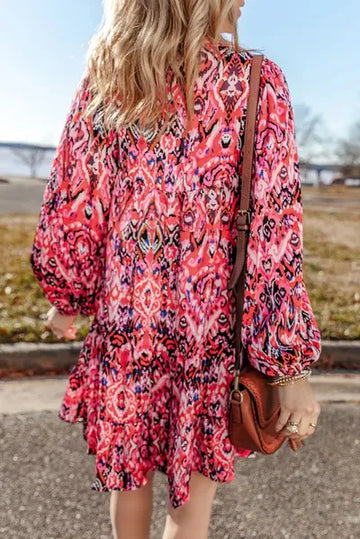 Robe à manches longues et col noué à imprimé pompons