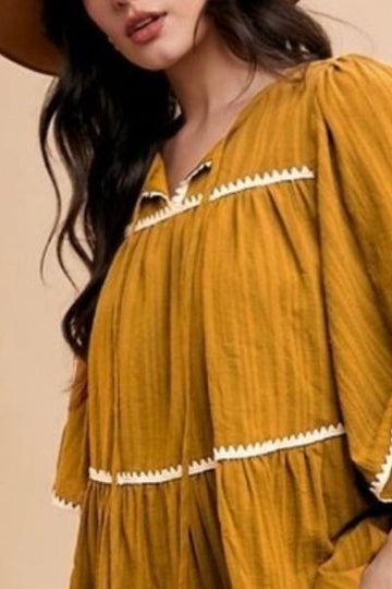 Robe à volants et manches mi-longues à bordure contrastée et col noué Annie Wear