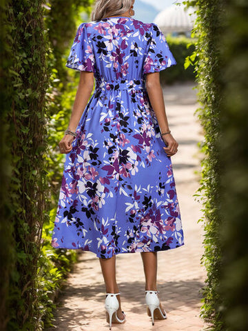 Robe mi-longue à manches courtes et imprimé asymétrique Perfee