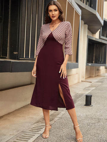 Robe mi-longue fendue à col en V et manches trois-quarts