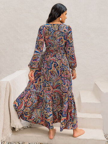 Robe midi imprimée à manches longues et col noué